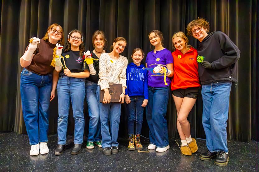 High school actors perform for younger students